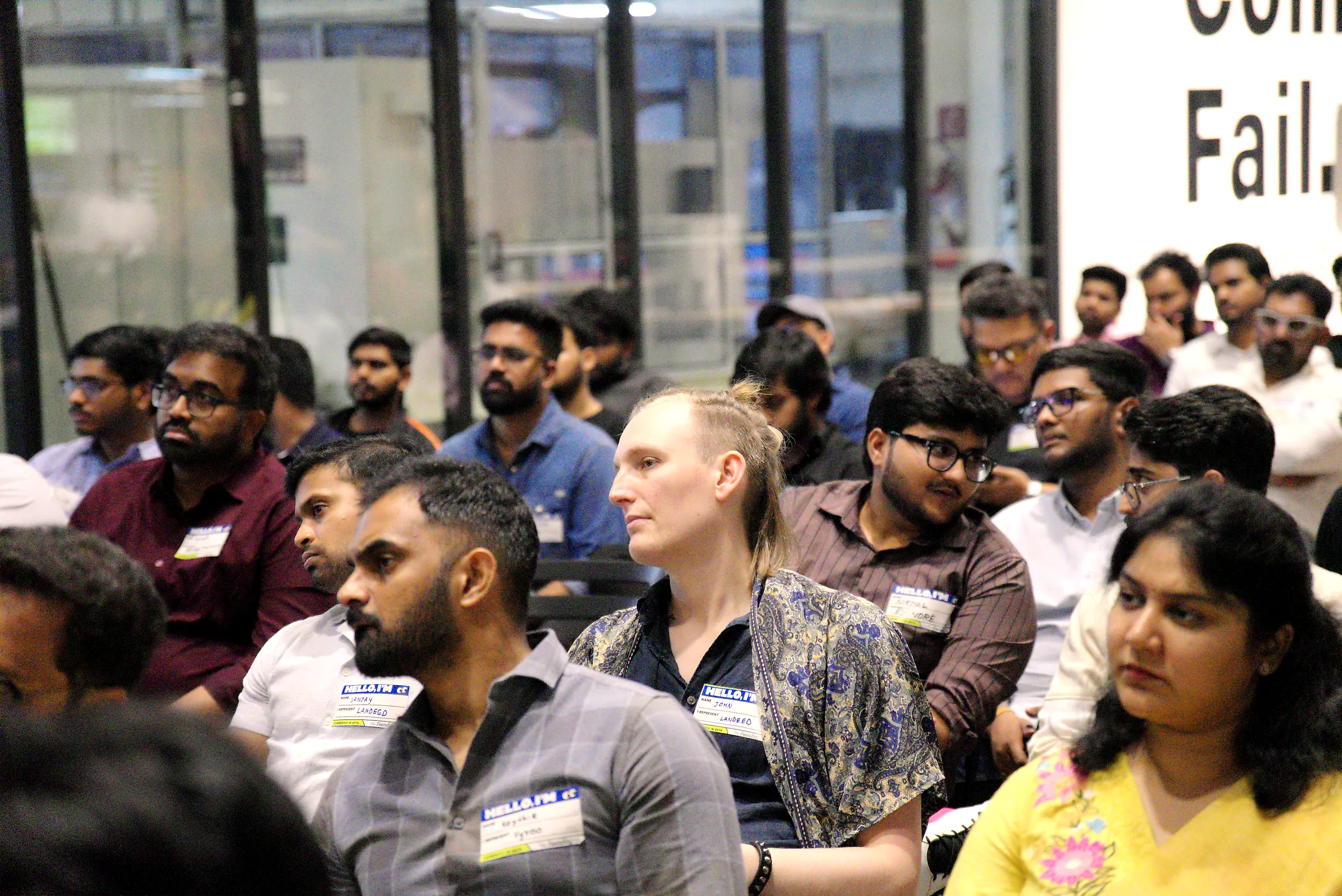 Guests in the audience listening to a pitch