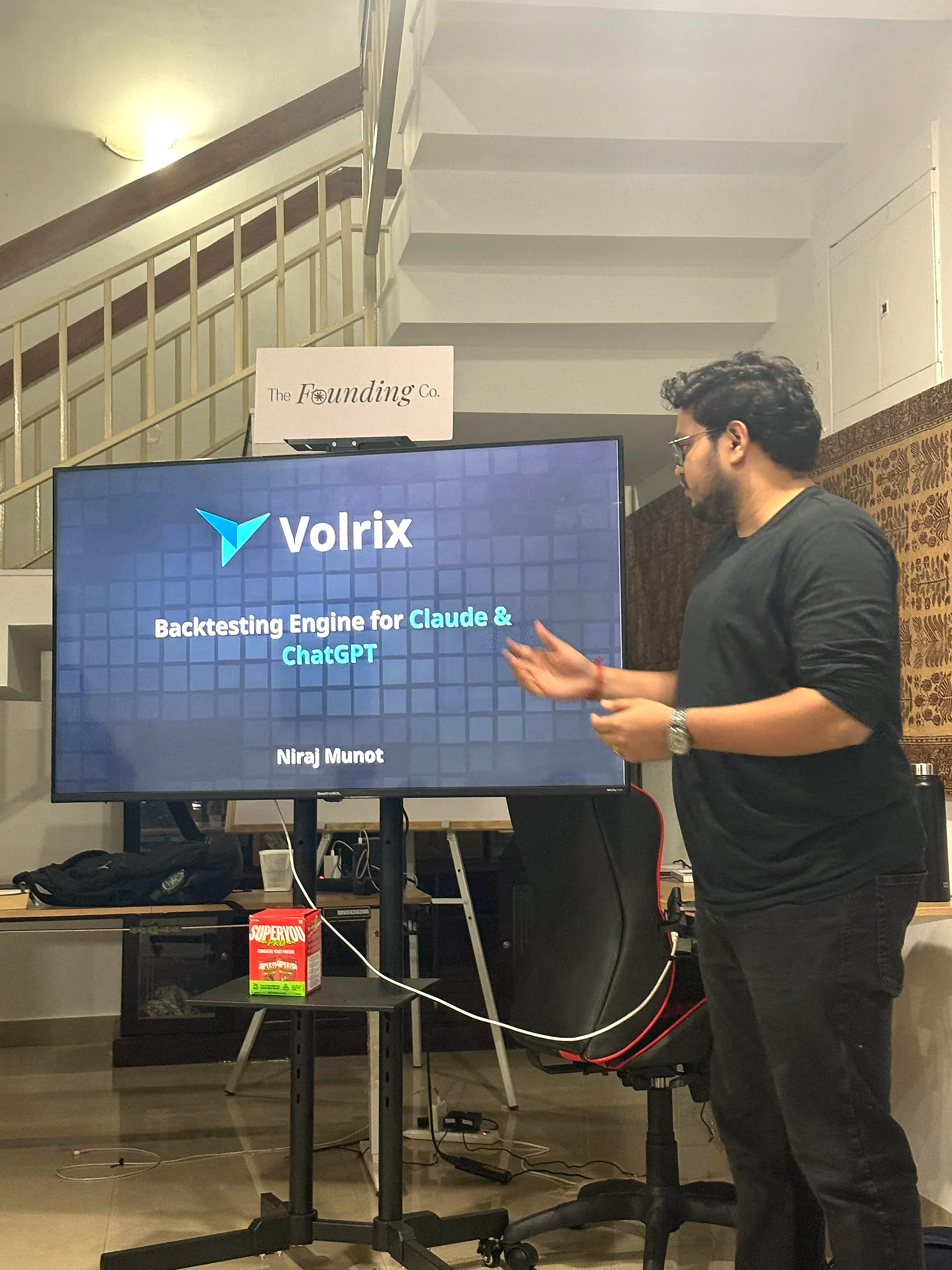 Niraj Munot presenting Volrix in front of a screen